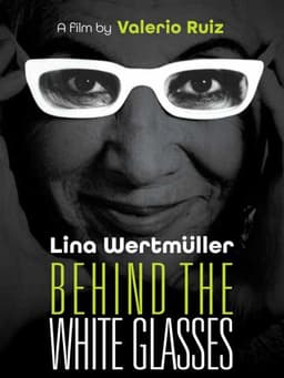 Behind the White Glasses